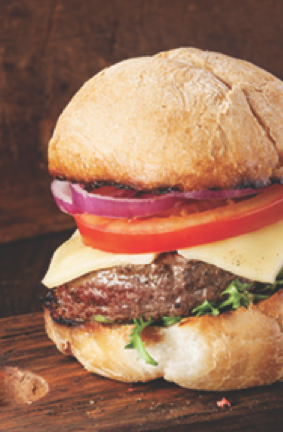 delicious, juicy burger, dressed with Burger Butters™ from Creekside Creamery™